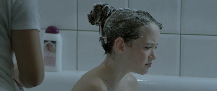 11-Year-old Maria Annette Tanderø Berglyd in bathroom. 